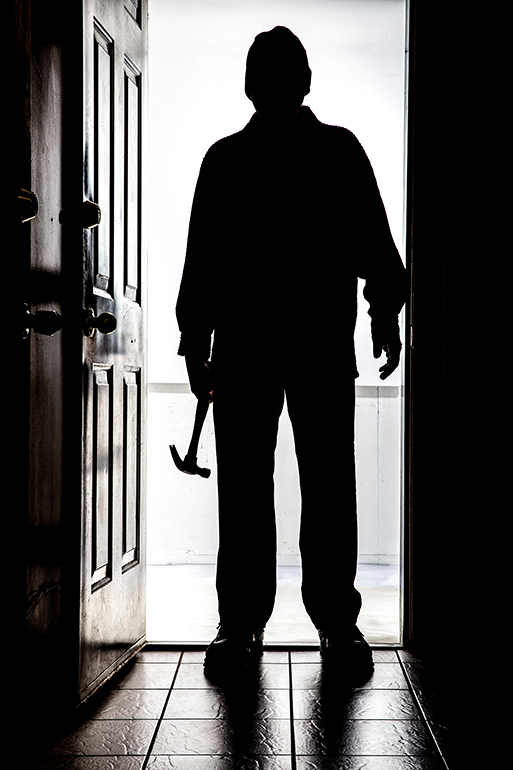 Intruder home invasion burglar hammer night dark