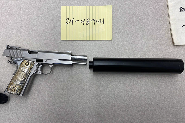 Seattle Police Department evidence photo gun silencer suppressor