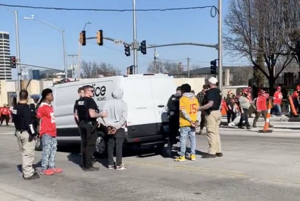 Social media screen cap of Kansas City shooting suspects being taken into custody (X)