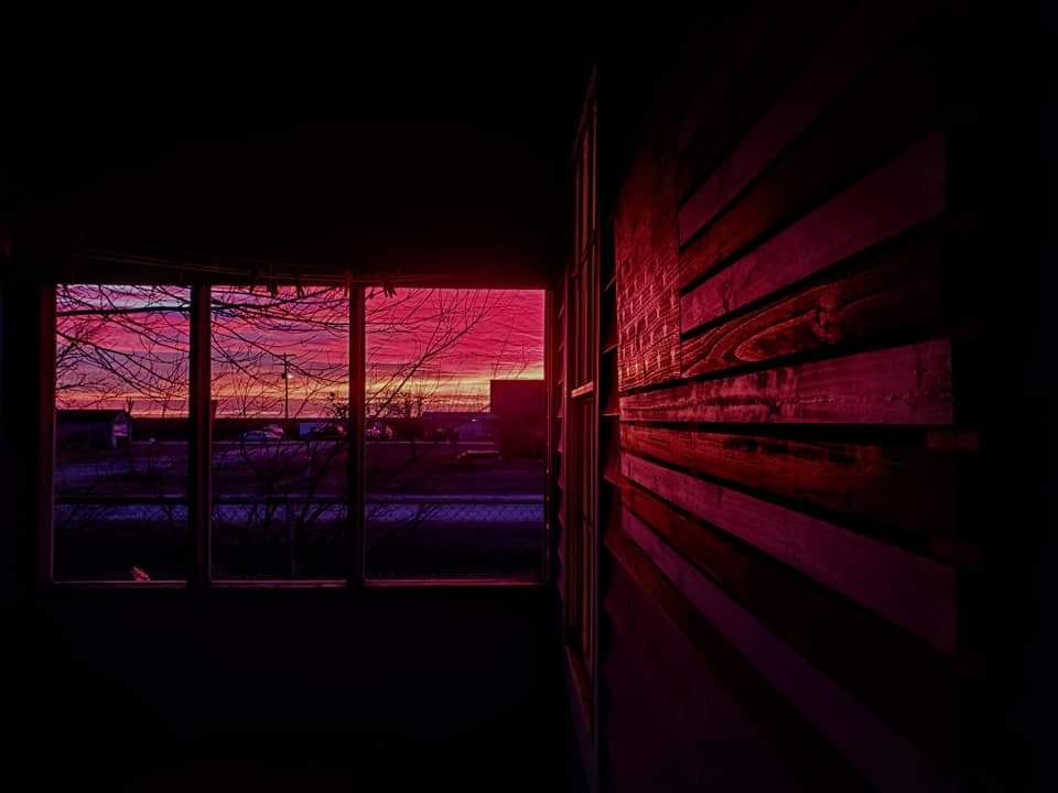 american flag at sunset