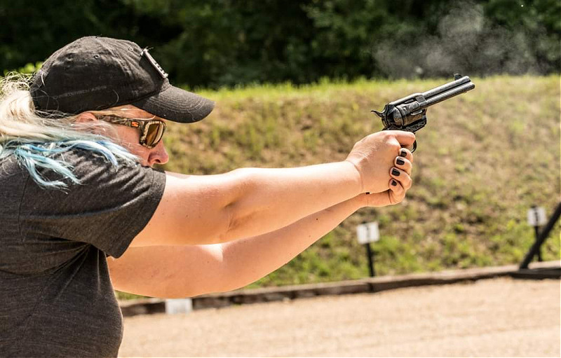 woman shooting revolver