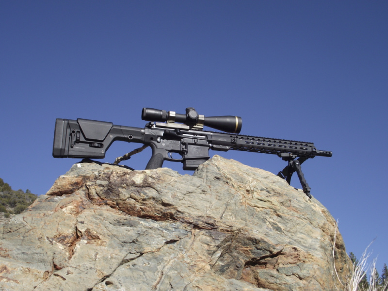 rifle on rock