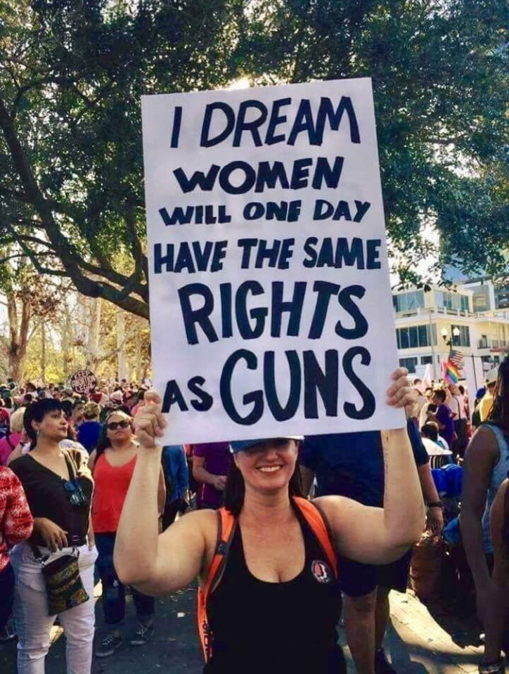 women same rights as guns gun control protest sign