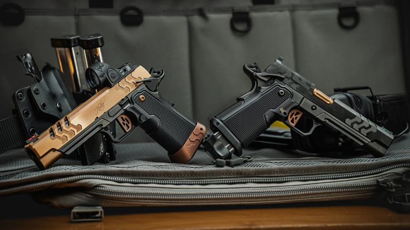 two kimber 2k11 pistols