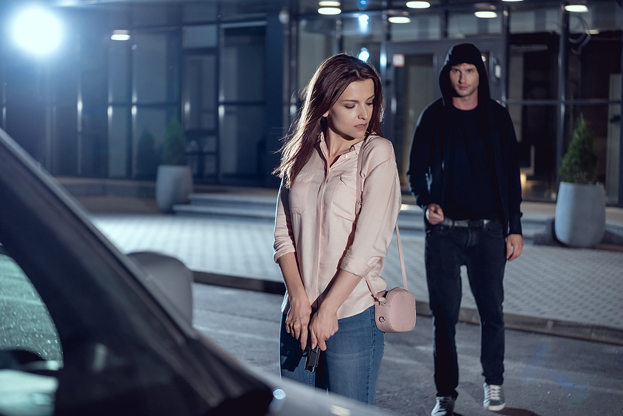 woman gun self-defense mugger thief robber