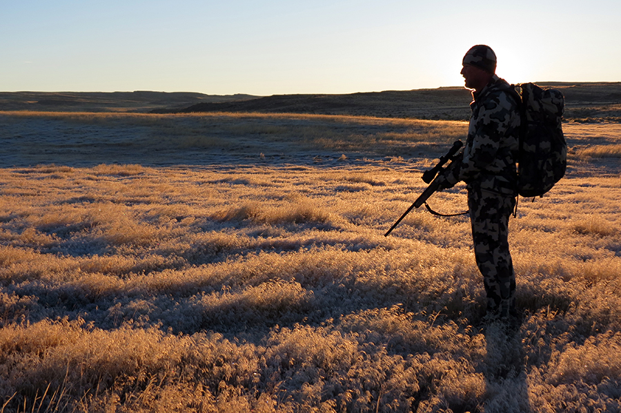 Exposed hunter hunting rifle