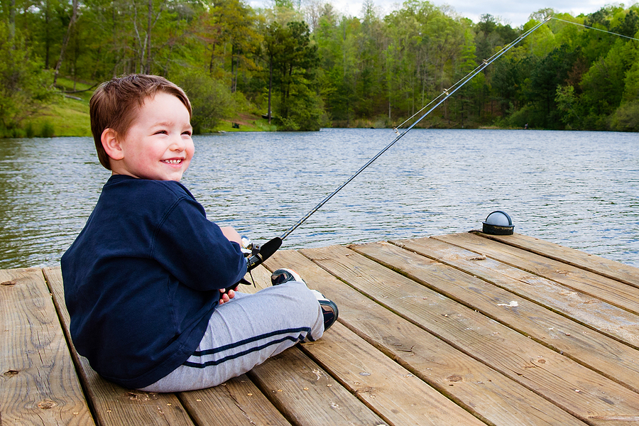 kid boy fishing dock bigstock