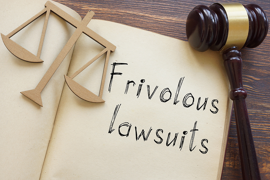 Frivolous Lawsuits Are Shown On A Photo Using The Text