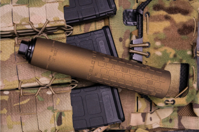 rifle suppressor on vest